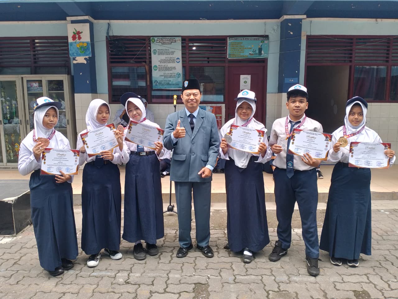Rebut 6 Medali! Pencak Silat SMP Muhammadiyah 1 Semarang Ukir Sejarah di Kejuaraan Kota